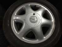 Alu kolo originál OPEL 7x15" ET49, 4x100x56.5 a 195/50 R15 82T Goodyear 10%