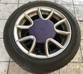 Alu kolo originál FORD 5,5x14" 4x108x63,3 ET30.5 a Continental SportContact CH52 165/60 R14 75H 40%