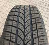 Plechový disk OPEL 6.5x16" ET39, 5x110x65 a Kormoran SnowPro B2 205/55 R16 94H XL 95% + Poklice