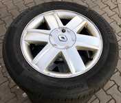 Alu kolo originál RENAULT 6.5x16" ET49 4x100x60 a Continental ContiPremiumContact 5 205/55 R16 91V 40%