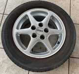 Alu kolo TITAN 6x14" ET37, 5x100x57 a 2ks Saetta Touring 2 185/60 R14 82H 30% a 2ks Hankook K715 Optimo 185/60 R14 82T 30%