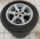 Alu kolo TITAN 6x14" ET37, 5x100x57 a 2ks Saetta Touring 2 185/60 R14 82H 30% a 2ks Hankook K715 Optimo 185/60 R14 82T 30%